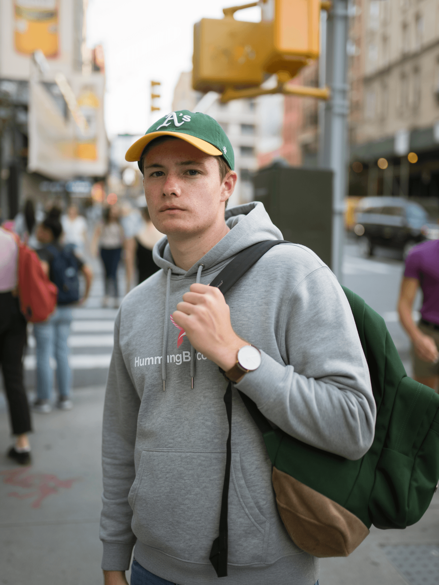 Image composition benchmark by FLUX.2 Flex with the man wearing the reference hoodie