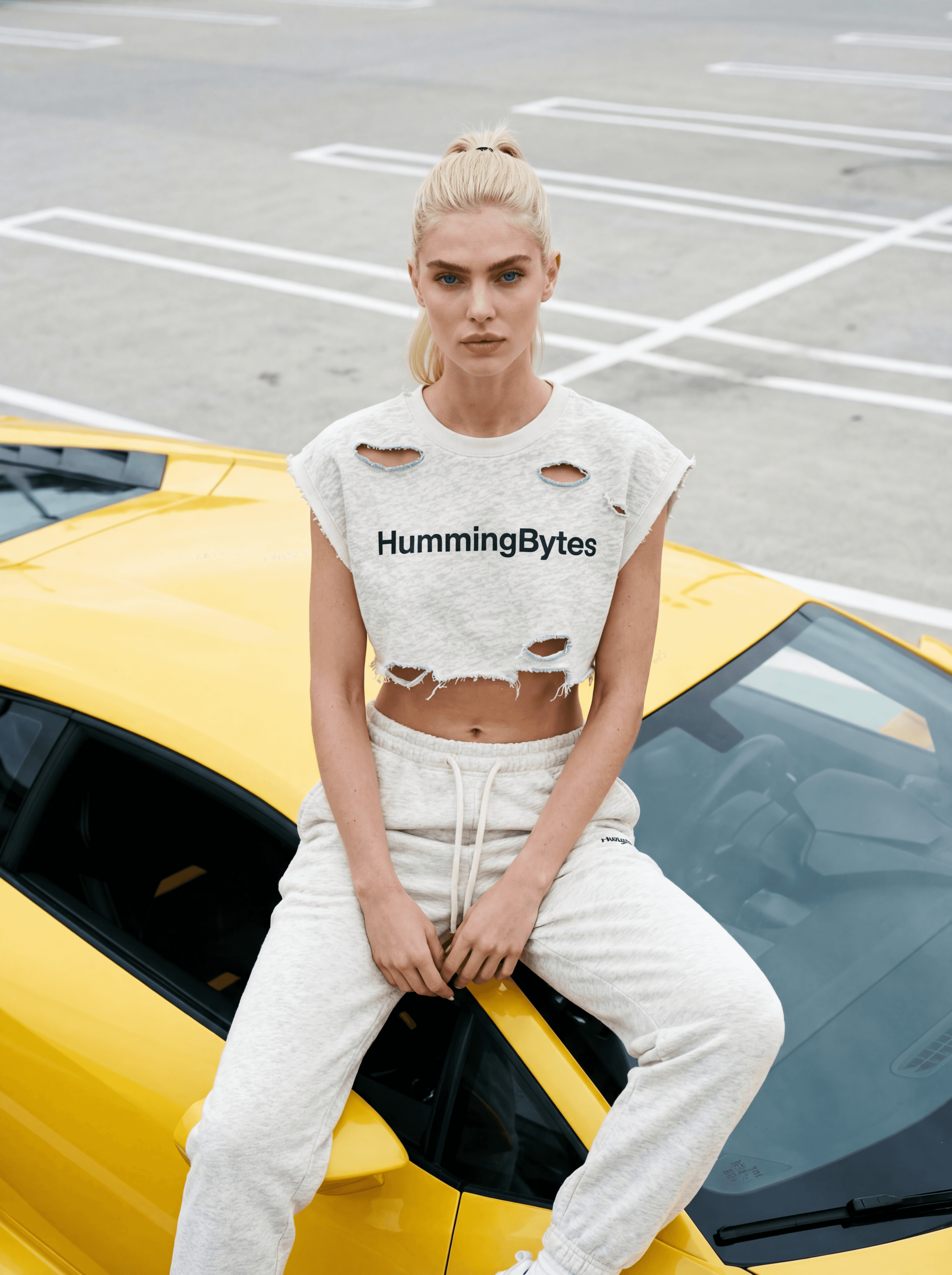 Example: editorial portrait with yellow supercar