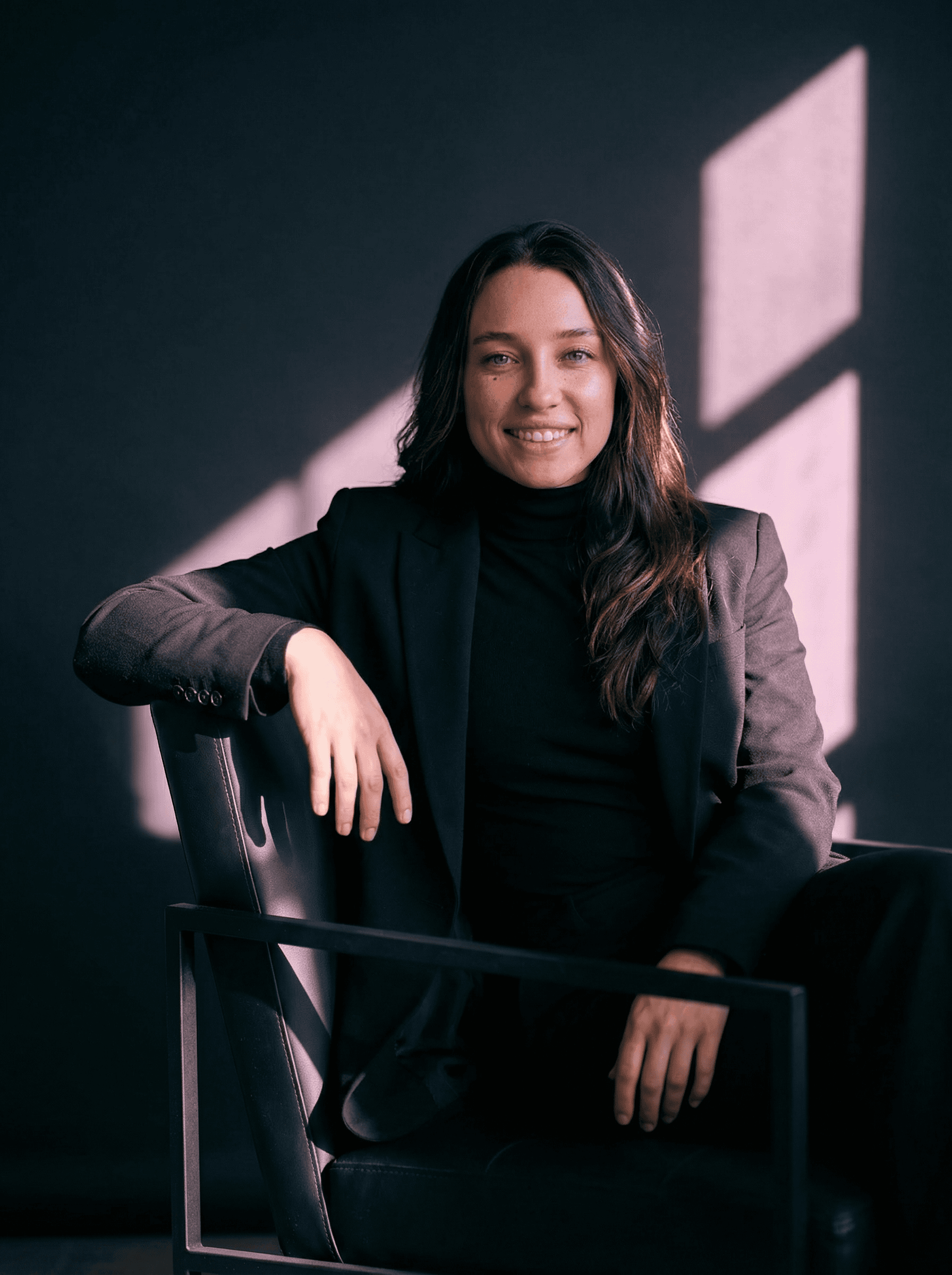 Example: moody black chair editorial portrait