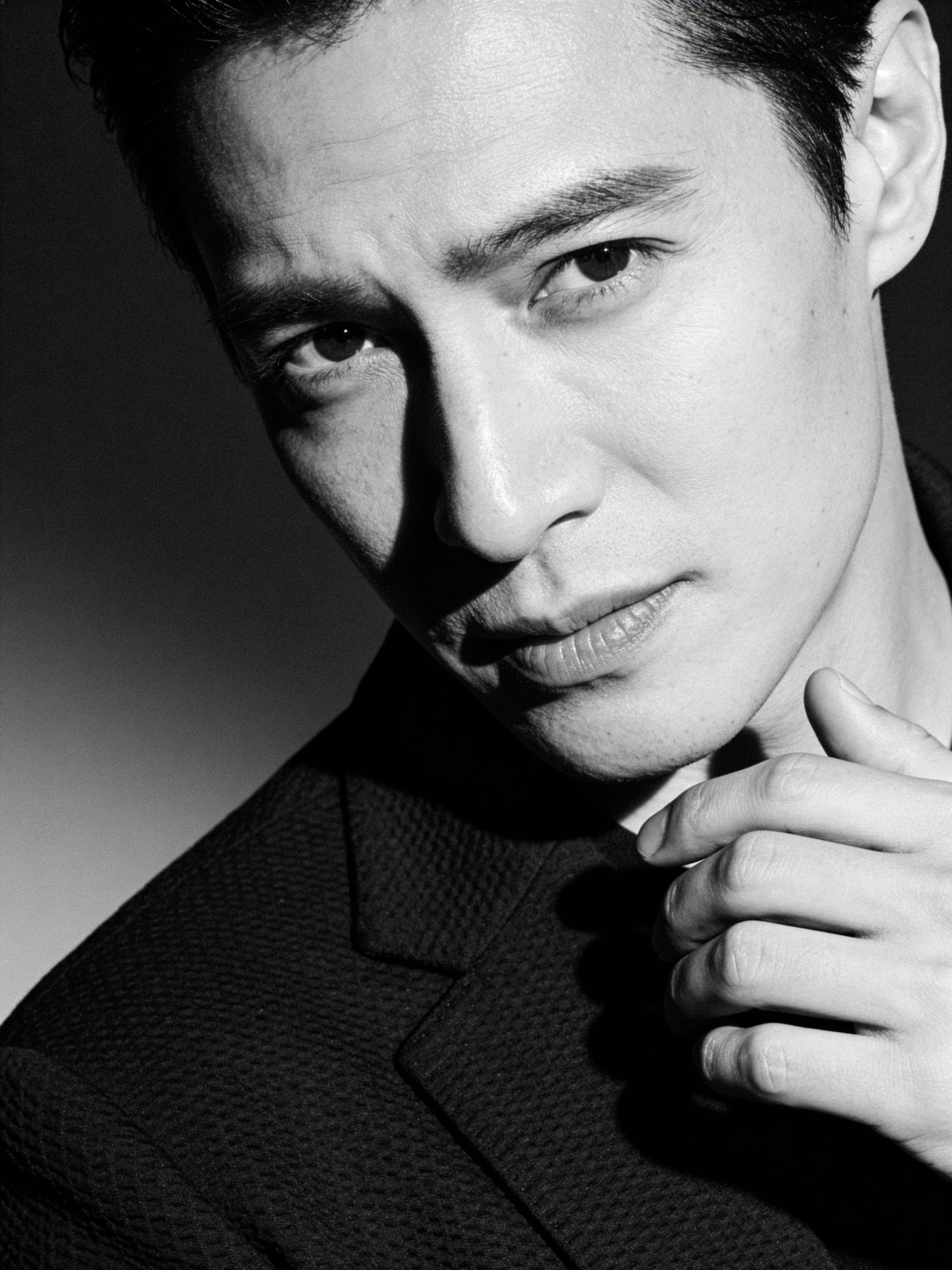 Monochrome headshot with sculpted side lighting