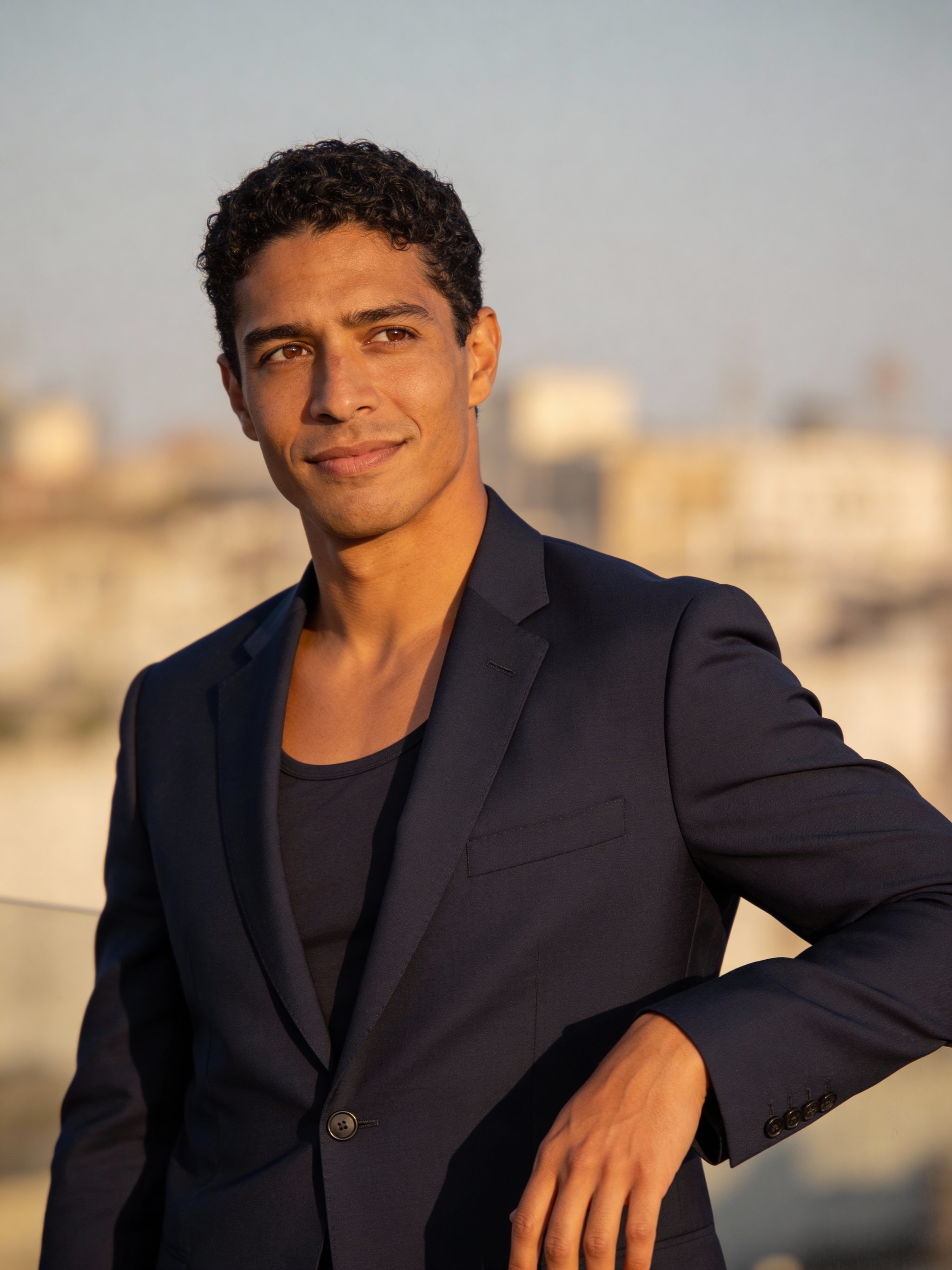 Premium real estate agent portrait with cinematic depth