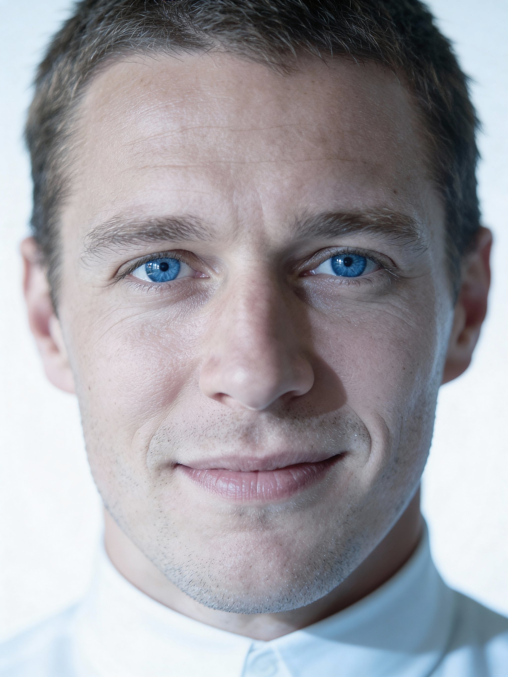 Tech executive style headshot with minimalist lighting