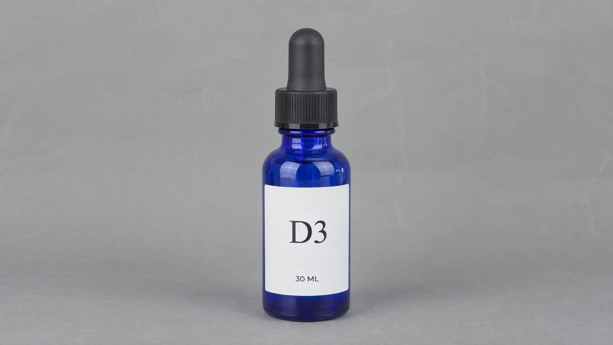 Cobalt blue dropper bottle with a black bulb and D3 label on gray paper, generated with AI