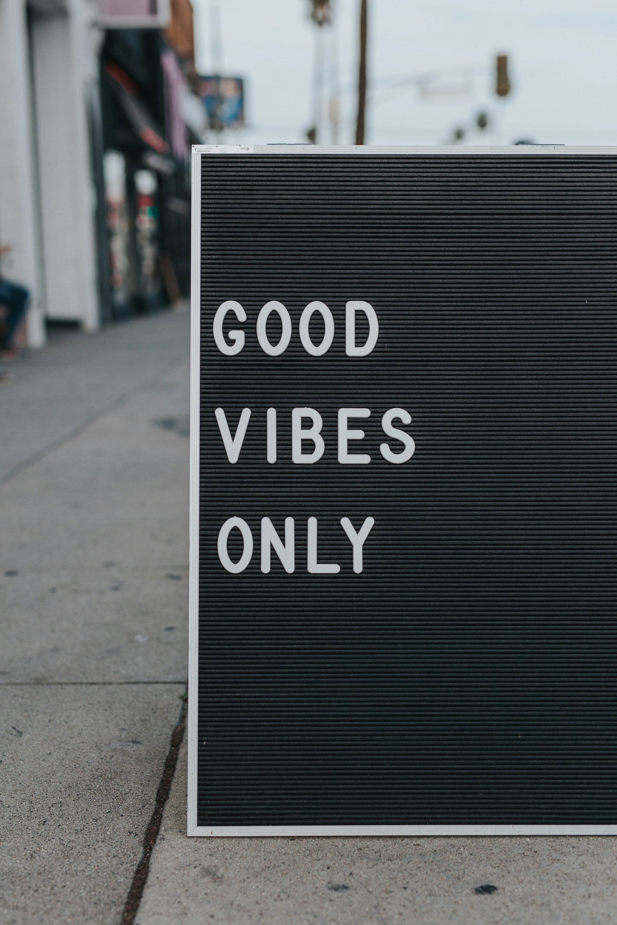 Original letter board sign reading "GOOD VIBES ONLY" used as input for the text replacement comparison